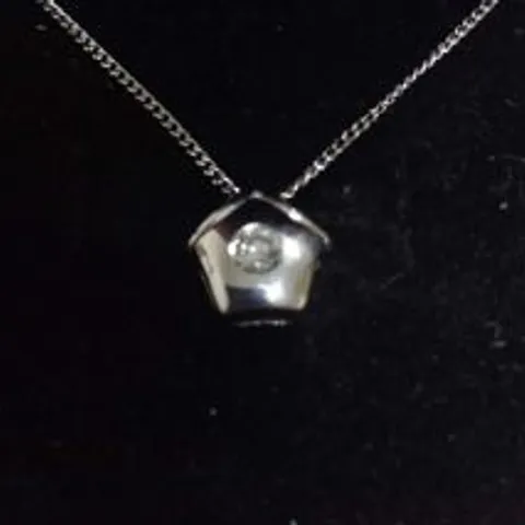 18CT WHITE GOLD SLIDER PENDANT ON CHAIN, RUB-OVER SET WITH A NATURAL DIAMOND