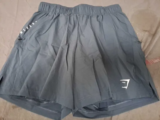 GYMSHARK SPORT SHORTS IN BLUE SIZE M-SLIM FIT 