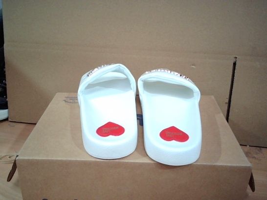 BOXED PAIR OF MOSCHINO SLIDERS WITE SIZE 41 