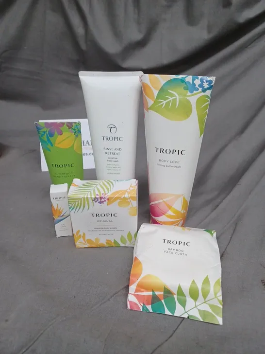 LOT OF 6 TROPIC SKIN CARE PRODUCTS TO INCLUDE BODY WASH, LIP OIL AND A BAMBOO FACE CLOTH