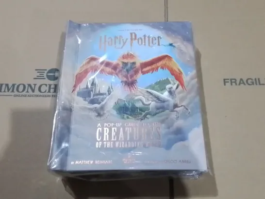 LOT OF 5 BRAND NEW HARRY POTTER POP UP CREATURE GUIDES