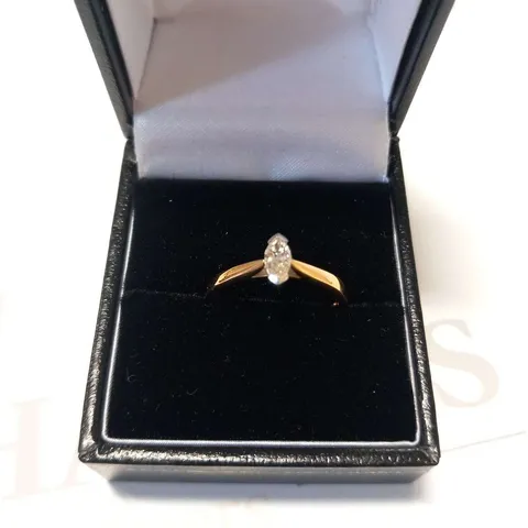 18CT GOLD SOLTAIRE RING SET WITH A NATURAL MARQUISE CUT DIAMOND