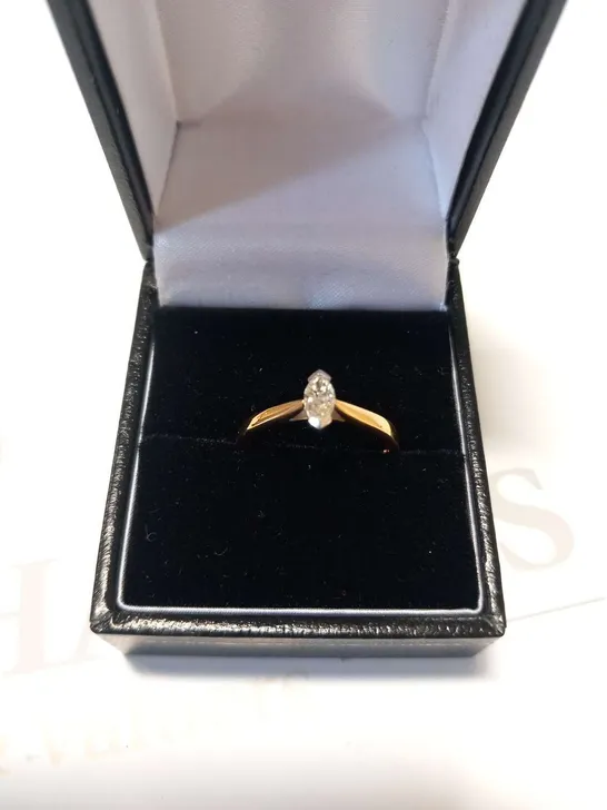 18CT GOLD SOLTAIRE RING SET WITH A NATURAL MARQUISE CUT DIAMOND