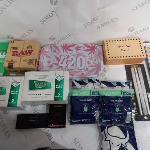 APPROXIMATELY 10 ASSORTED HOUSEHOLD ITEMS TO INCLUDE BULL BRAND ROLLING PAPER, ROLLIG TRAY, AND RAW PAPERS ETC.