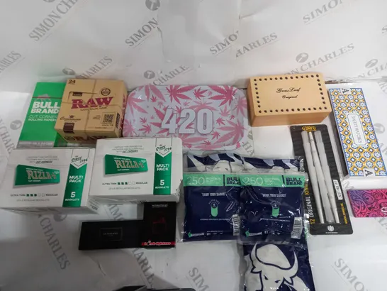 APPROXIMATELY 10 ASSORTED HOUSEHOLD ITEMS TO INCLUDE BULL BRAND ROLLING PAPER, ROLLIG TRAY, AND RAW PAPERS ETC.