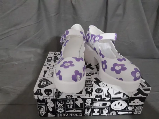 BOXED PAIR OF KOI TIRA MARY JANES 'MINOR MIRACLE EDITION' WHITE PURPLE FLOWERS SIZE 6