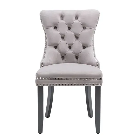 BOXED KRONQUI UPHOLSTERED DINING CHAIR UPHOLSTERY COLOUR: SILVER GREY