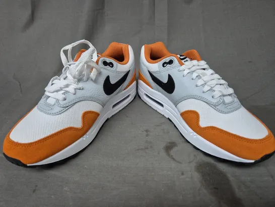 BOXED PAIR OF NIKE AIR MAX 1 SHOES IN WHITE/GREY/ORANGE UK SIZE 6