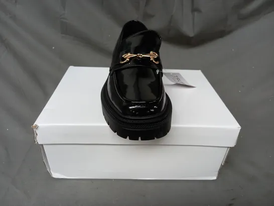 BOXED PAIR OF TRUFFLE COLLECTION LOAFERS IN GLOSSY BLACK W. GOLD EFFECT DETAIL SIZE 5