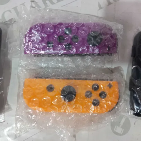 NINTENDO SWITCH SET OF CONTROLLERS IN PURPLE AND ORANGE