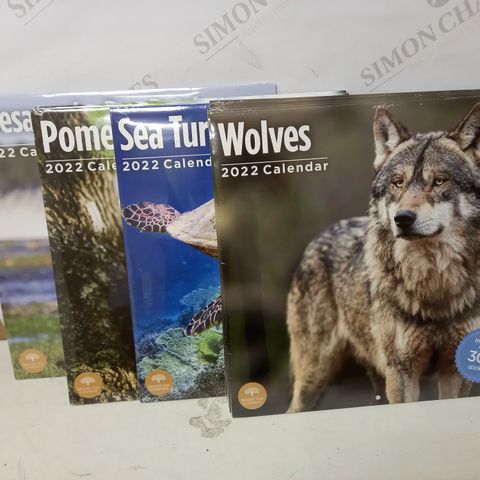 LOT OF 10 ASSORTED 2022 CALENDERS TO INCLUDE SEA TURTLES, WOLVES, POMERANIANS, ETC