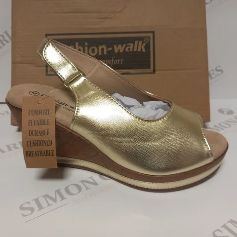 BOXED PAIR OF CUSHION WALK WEDGE HEELED STRAPPY SHOES IN GOLD - SIZE 4