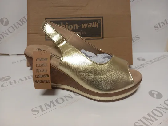 BOXED PAIR OF CUSHION WALK WEDGE HEELED STRAPPY SHOES IN GOLD - SIZE 4