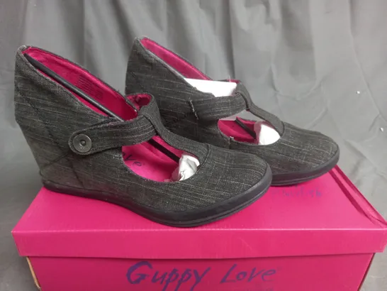 BOX OF APPROXIMATELY 12 BLACK  GUPPY LOVE BY BLOWFISH SHOES IN VARIOUS SIZES 