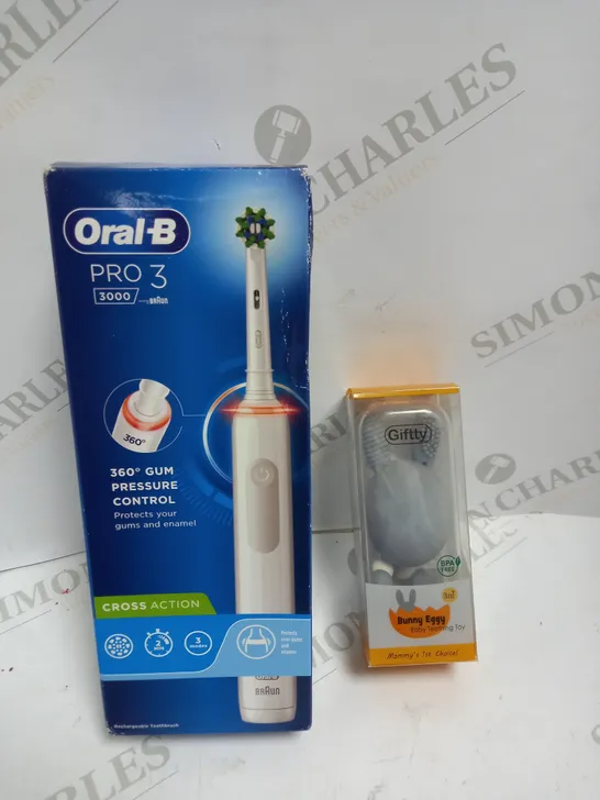 LOT OF TWO TO INCLUDE ORAL B PRO 3 AND BABY TEETHING TOY