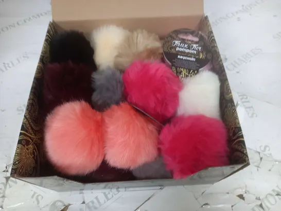 LOT OF 4 BOXES OF FAUX FUR POM POM KEYRINGS