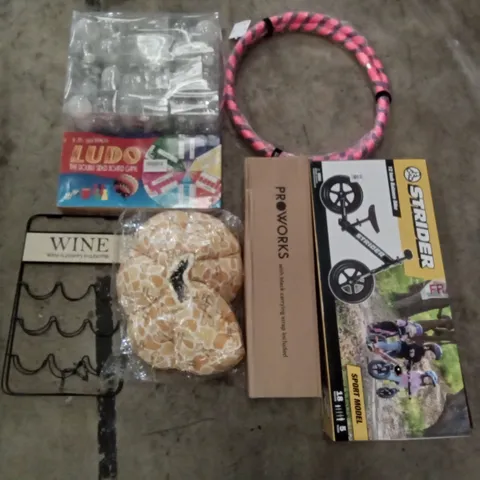 PALLET OF ASSORTED ITEMS INCLUDING WINE RACK, HULA HOOPS, CLEAR BAUBLE SET, PROWORKS, 12" BALANCE BIKE, LUDO DOUBLE SIDED BOARD