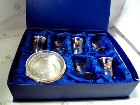 BOXED GLASS CUP AND SAUCER SET 