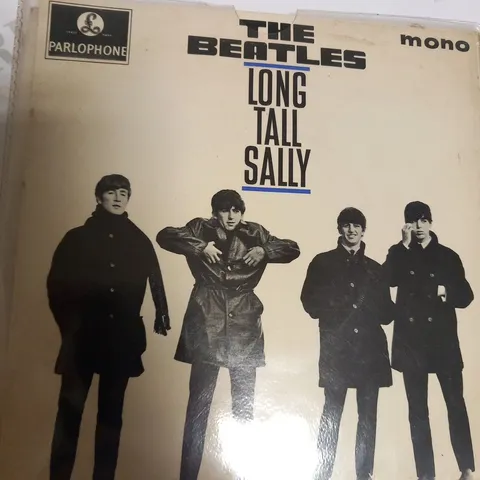 4 ASSORTED THE BEATLES VINYL RECORDINGS TO NCLUDE; LONG TALL SALLY, SHE LOVES YOU, ALL YOU NEED IS LOVE AND TICKET TO RIDE