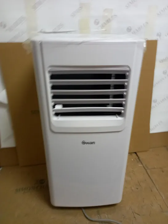 COMPACT AIR CONDITIONER