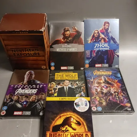 APPROXIMATELY 10 ASSORTED DVD MOVIES & BOX SETS TO INCLUDE JURASSIC WORLD, AVENGERS INFINITY WAR, THE WOLF OF WALL STREET ETC 
