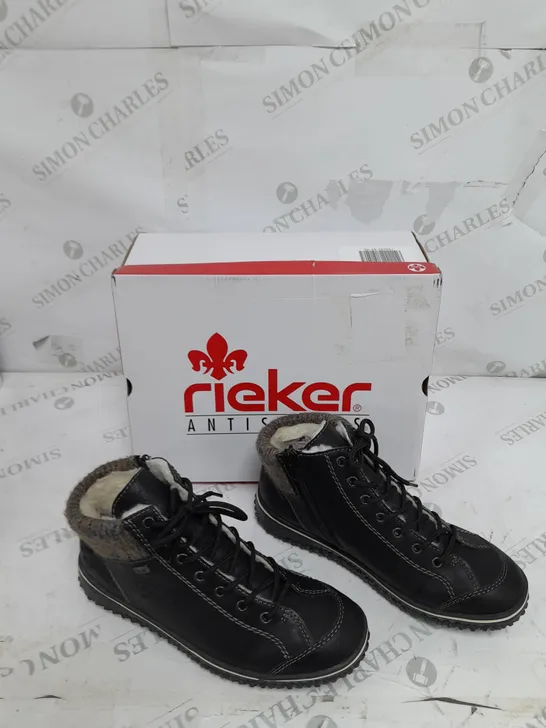 BOXED PAIR OF RIEKER LACE UP BOOTS IN BLACK SIZE 6