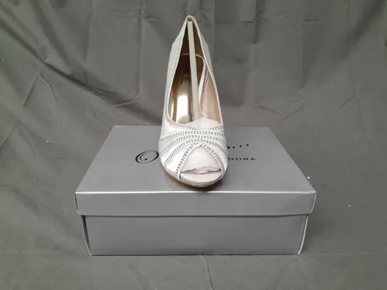 BOX OF APPROXIMATELY 10 BOXED PAIRS OF OCCASIONS BY CASANDRA PEEP TOE HIGH HEEL SHOES IN IVORY SATIN W. JEWEL EFFECT - VARIOUS SIZES