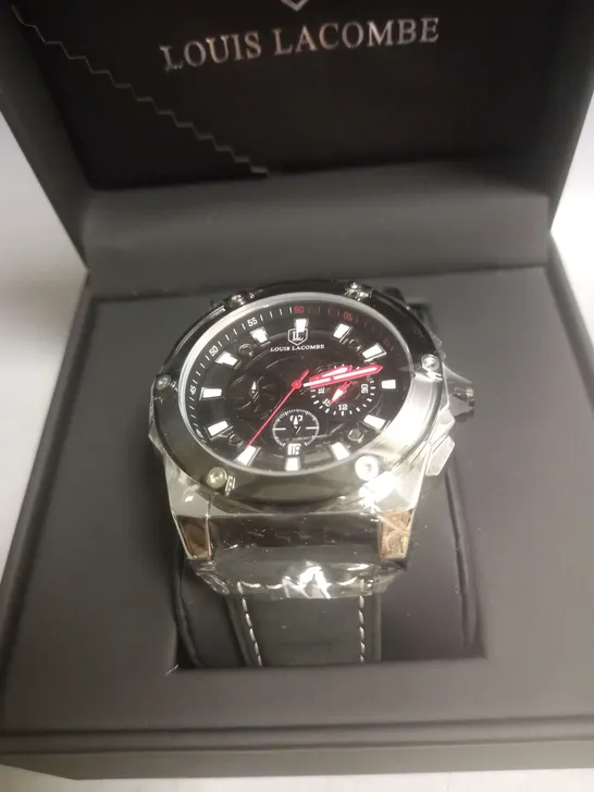 BOXED LOUIS LACOMBE WRIST WATCH IN BLACK/SILVER/RED