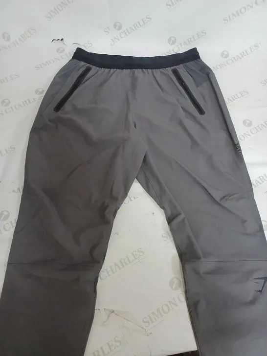 GYMSHARK STRETCH LIGHT GREY TROUSERS - MEDIUM