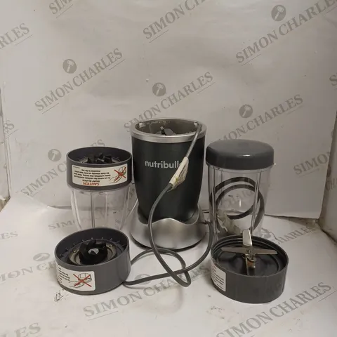 NUTRIBULLET BLENDER WITH ACCESSORIES. 