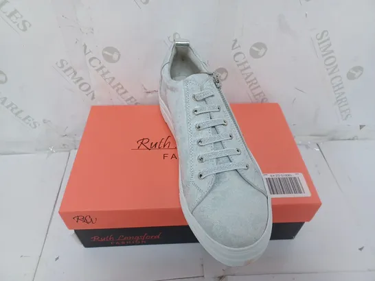 BOXED PAIR OF RUTH LANGSFORD ZIP DETAIL TRAINERS IN SILVER SIZE 8