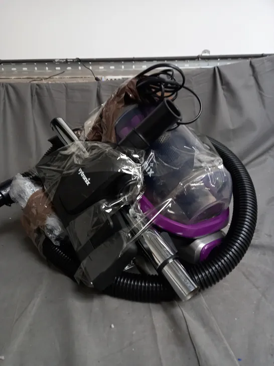 VYTRONIX CYCLONIC VACUMN CLEANER MODEL PET01 IN PURPLE AND SILVER