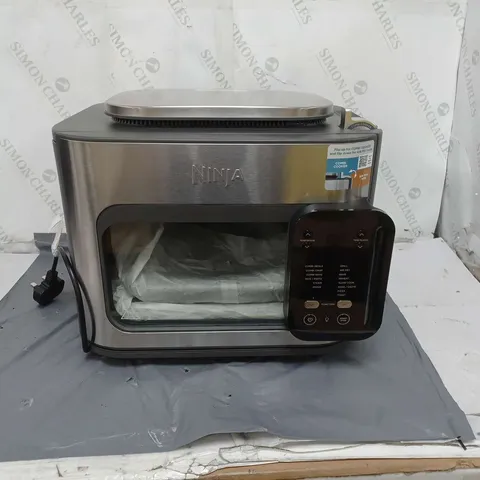 BOXED NINJA MULTIFUNCTION 14-IN-1 OVEN & AIR FRYER, DAMAGED ON BACK