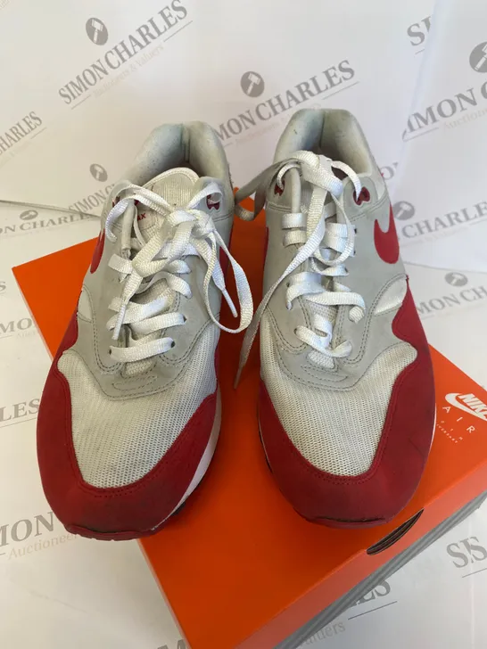 BOXED PAIR OF NIKE RED/GREY SIZE 9 TRAINERS 