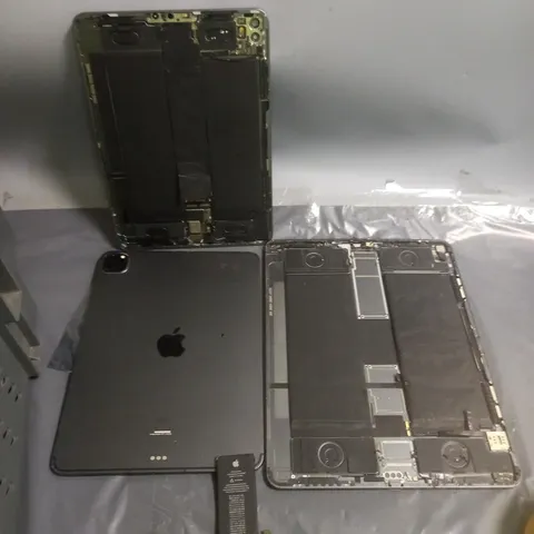 APPROXIMATELY 15 DAMAGED APPLE IPAD CASES VARIOUS MODELS