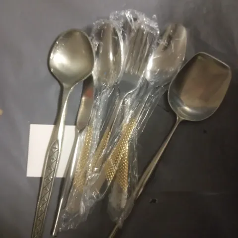 LARGE ASSORTMENT OF UTENSILS IN VARIOUS DESIGNS 