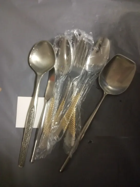 LARGE ASSORTMENT OF UTENSILS IN VARIOUS DESIGNS 