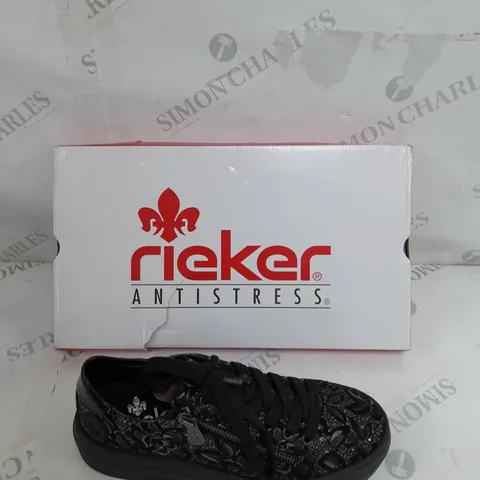 BOXED PAIR OF RIEKER FLORAL TRAINERS IN BLACK SIZE 4