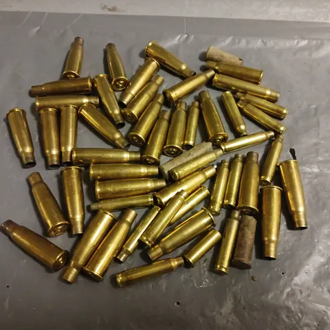 LOT OF ASSORTED METAL AMMUNITION SHELL CASINGS