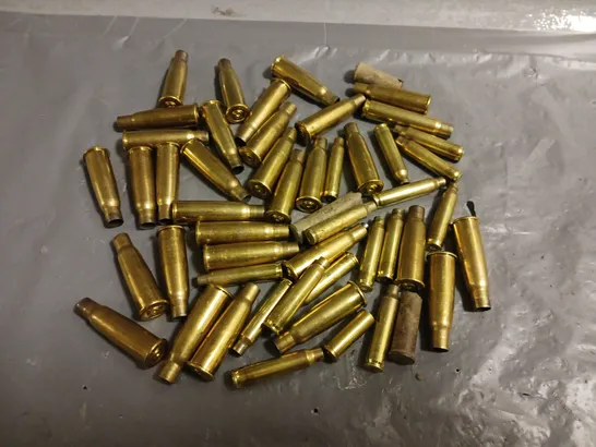 LOT OF ASSORTED METAL AMMUNITION SHELL CASINGS