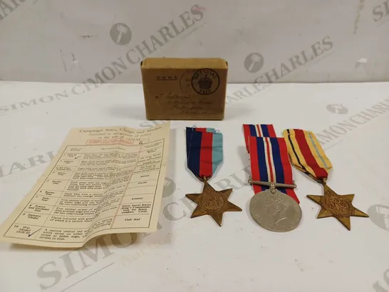 SMALL BOX CONTAINING 3 X ASSORTED BRITISH MILITARY SERVICE MEDALS WITH PAPERWORK