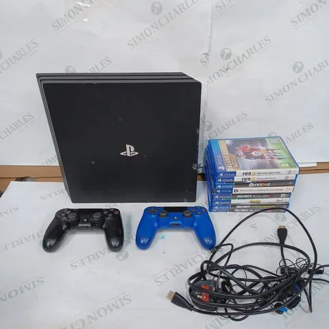 LOT TO CONTAIN A PLAYSTATION 4, INCLUDES CONSOLE, 8 X PS4 GAMES, 2 X CONTROLLERS & CONSOLE WIRES