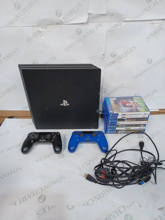 LOT TO CONTAIN A PLAYSTATION 4, INCLUDES CONSOLE, 8 X PS4 GAMES, 2 X CONTROLLERS & CONSOLE WIRES