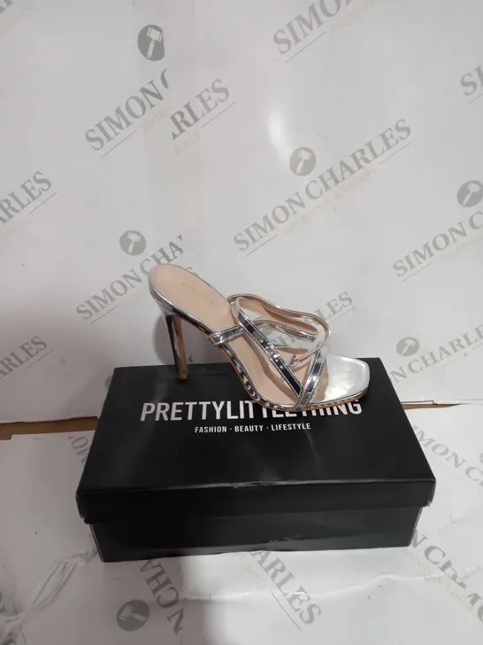 BOXED PAIR OF PRETTY LITTLE THING SQUARE TOE BARELY THERE STRAPPY HIGH HEELS SILVER SIZED 4 