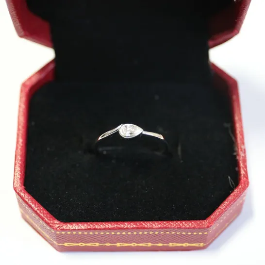 DESIGNER 9CT WHITE GOLD SOLITAIRE RING RUB OVER SET WITH A PEAR SHAPE DIAMOND WEIGHING +0.41CT