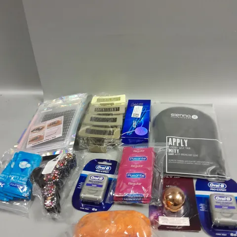 APPROXIMATELY 15 ASSORTED COSMETICS AND BEAUTY ITEMS TO INCLUDE CONDOMS, FAKE EYELASHES AND ORAL-B