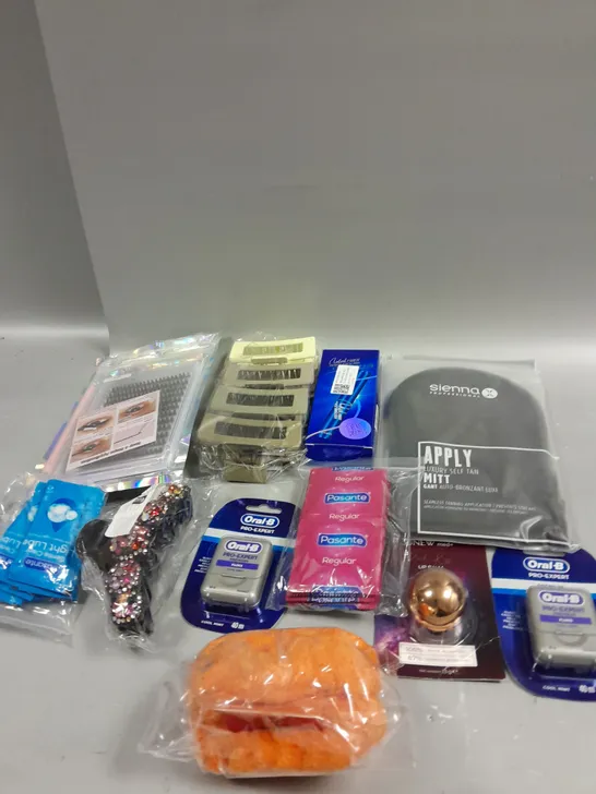 APPROXIMATELY 15 ASSORTED COSMETICS AND BEAUTY ITEMS TO INCLUDE CONDOMS, FAKE EYELASHES AND ORAL-B