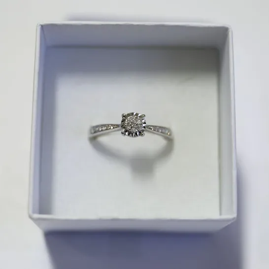 9CT WHITE GOLD DIAMOND CLUSTER RING WITH DIAMOND SHOULDERS