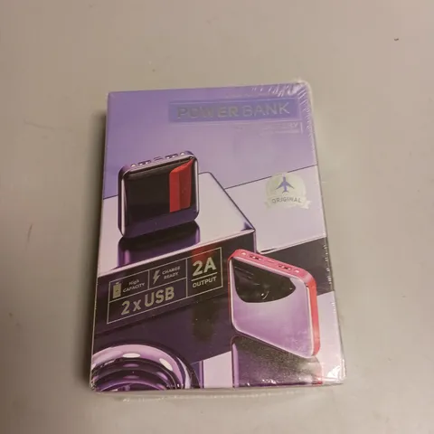 SEALED UNBRANDED POWER BANK IN PURPLE AND RED X2 USB PORTS