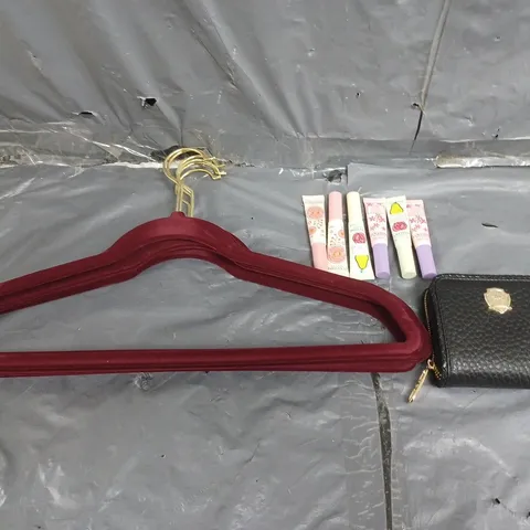 LARGE BOX OF APPROXIMATELY 10 ASSORTED ITEMS TO INCLUDE CLOTHES HANGERS, L'OCCITANE AND LEATHER PURSE